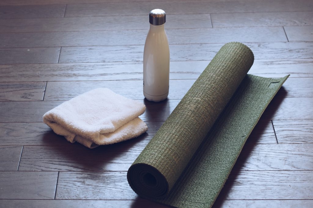 yoga mat reusable water bottle and white face tow 2022 11 14 06 14 42 utc